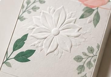Aligned embossed floral packaging artwork