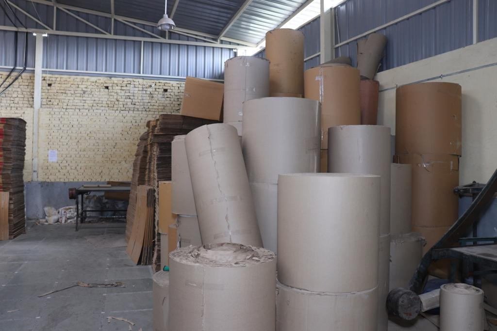 Large paper rolls stored in the Boxxcut facility